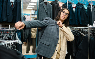 man trying on suit