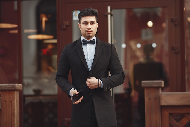 A man in a bespoke tuxedo - learn more about the definition with Pearce Bespoke. 