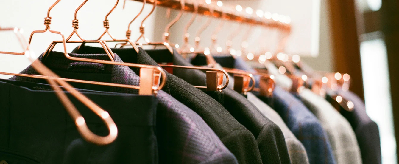 An image of bespoke tailored suits - embrace sustainable practices with Pearce Bespoke.