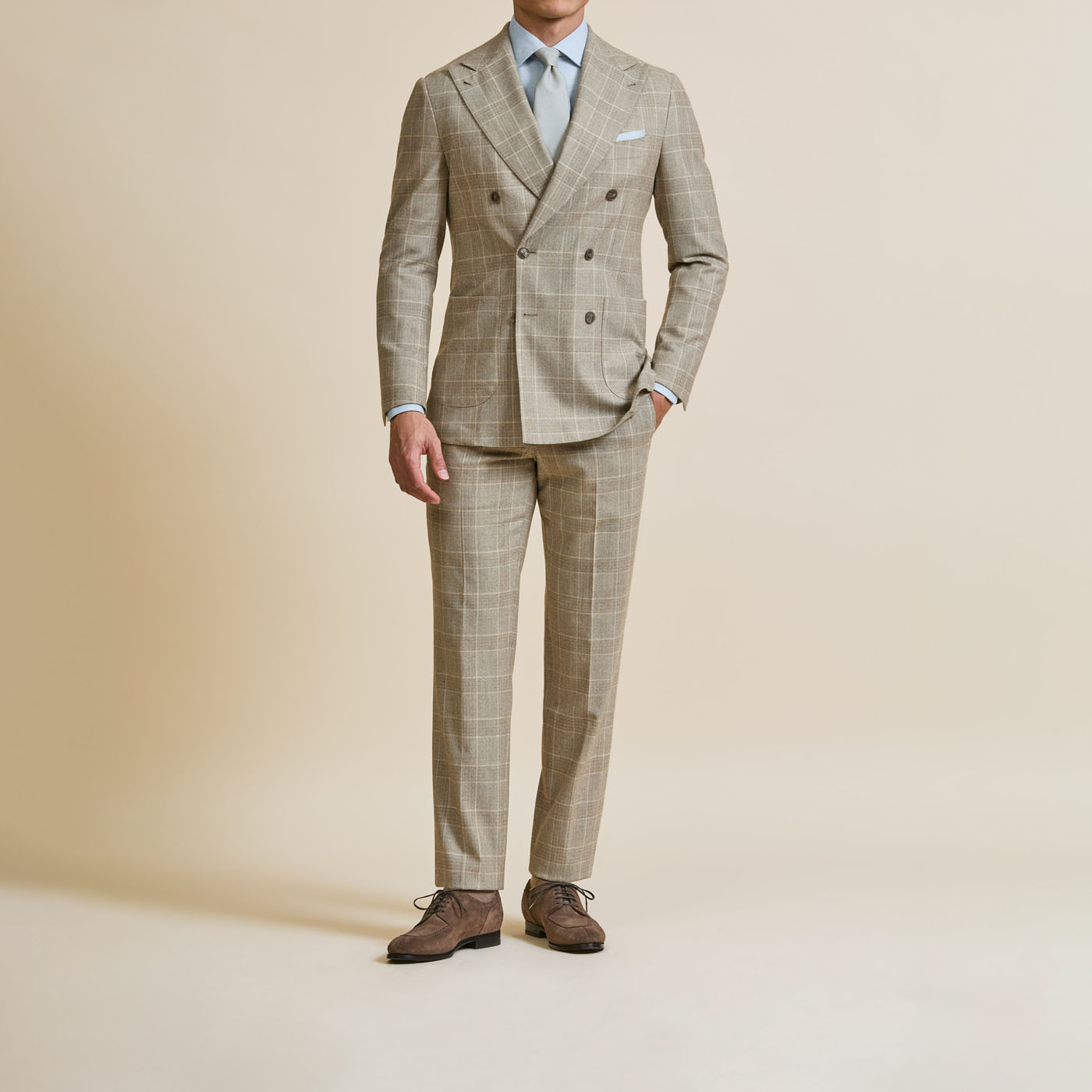 A light-colored Pearce Bespoke Greater Syracuse custom suit.