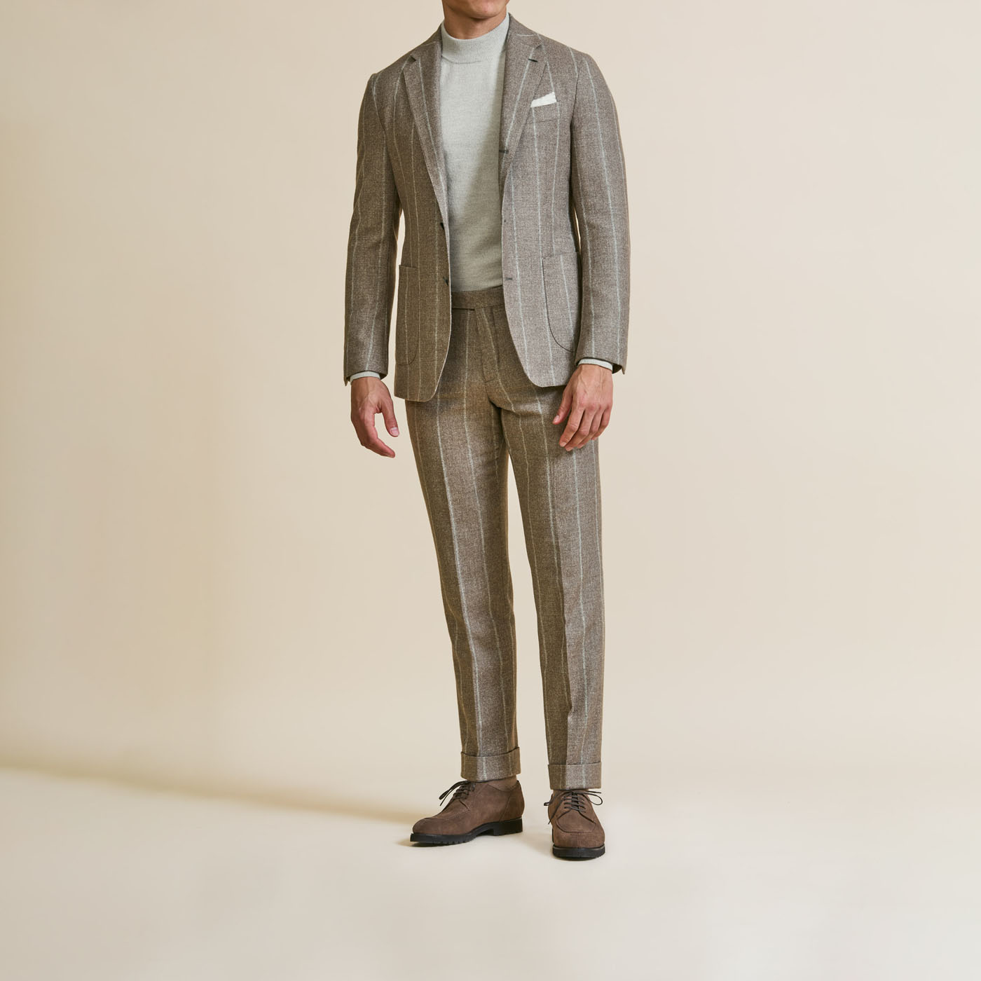 A model styling a casually professional Pearce Bespoke Greater Syracuse custom suit.