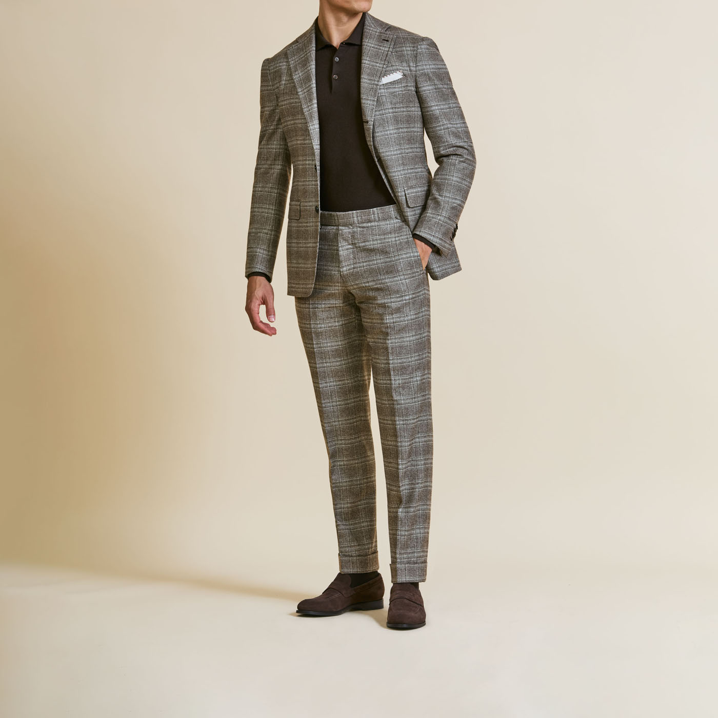 A stylish, gray plaid tailored suit from Pearce Bespoke Greater Syracuse.
