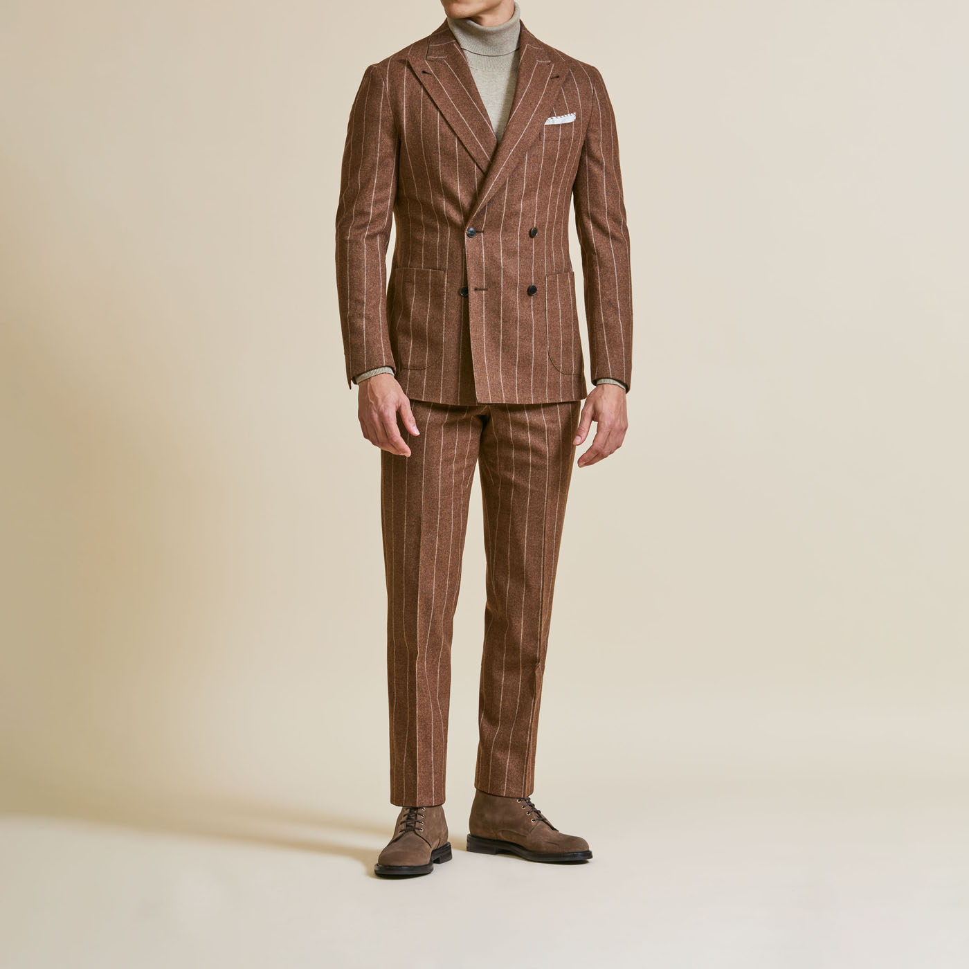 A stylish bronze Pearce Bespoke Greater Syracuse double-breasted suit.