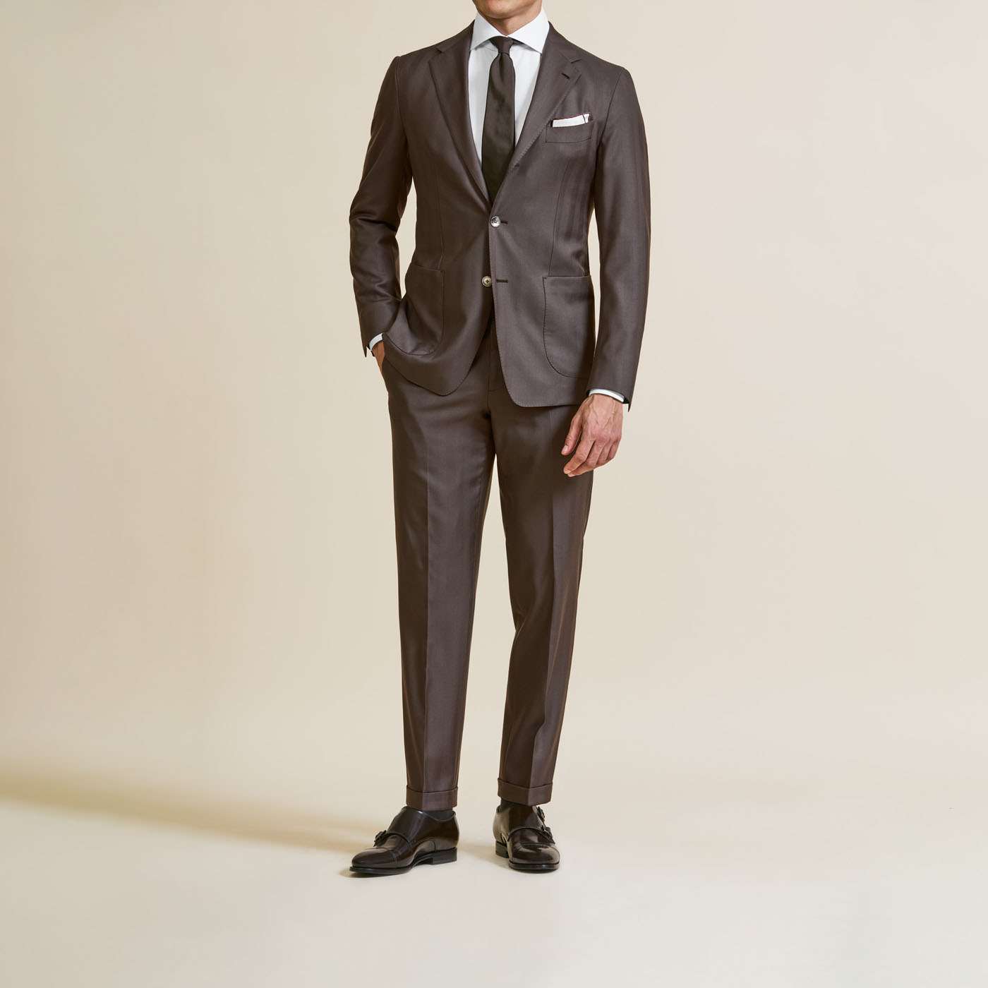 A classic black Pearce Bespoke Greater Syracuse custom suit worn by a male model.