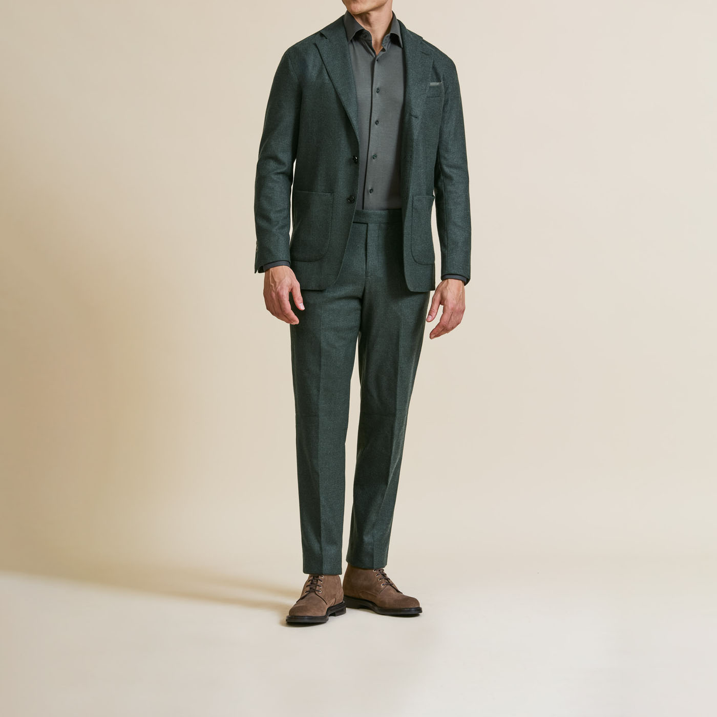 An elegant green tailored suit from the professionals with Pearce Bespoke Greater Syracuse.