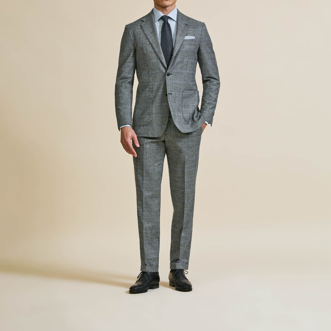 A custom, tailored suit in a double-breasted style from Pearce Bespoke Greater Syracuse.