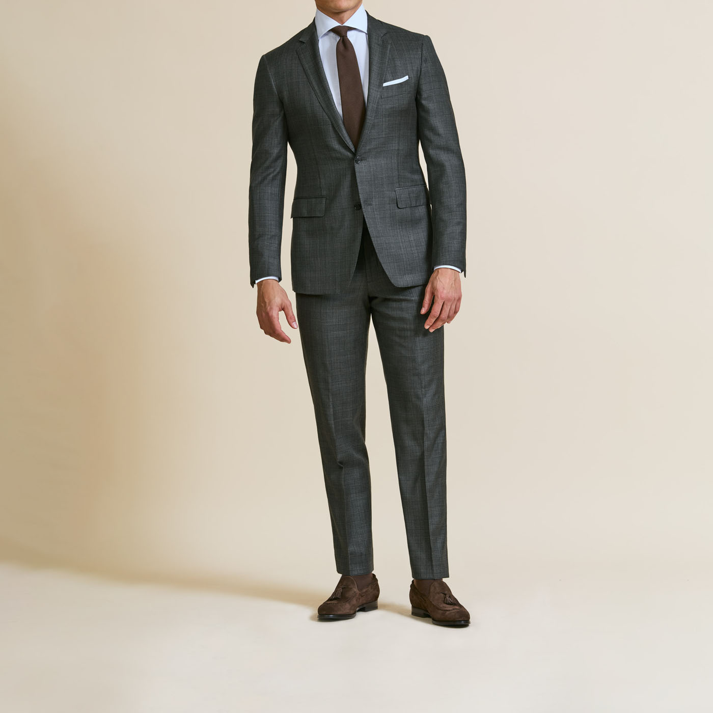 A Pearce Bespoke Greater Syracuse custom suit on a male model, professionally styled.