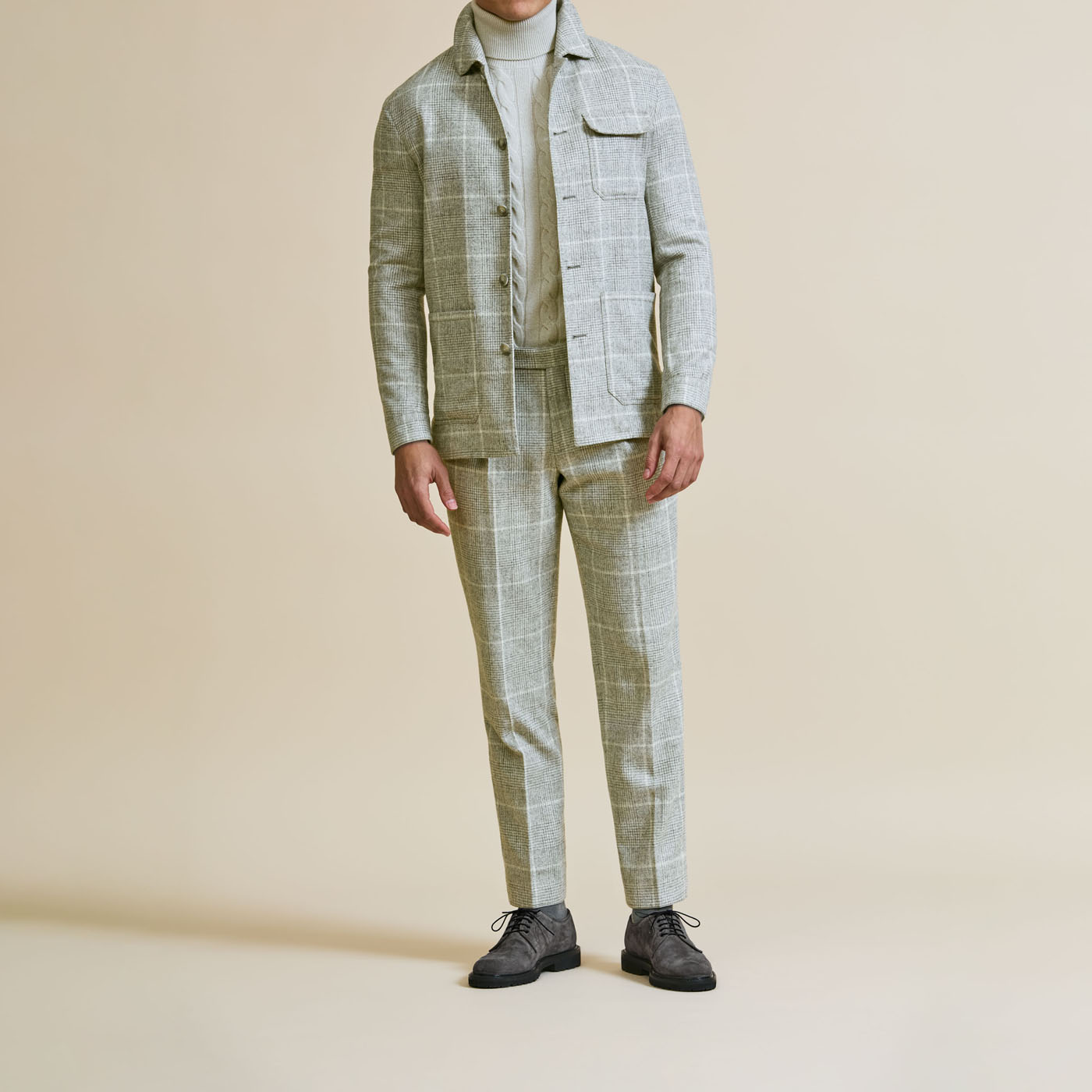 A stylish, light-colored Pearce Bespoke Greater Syracuse custom suit.