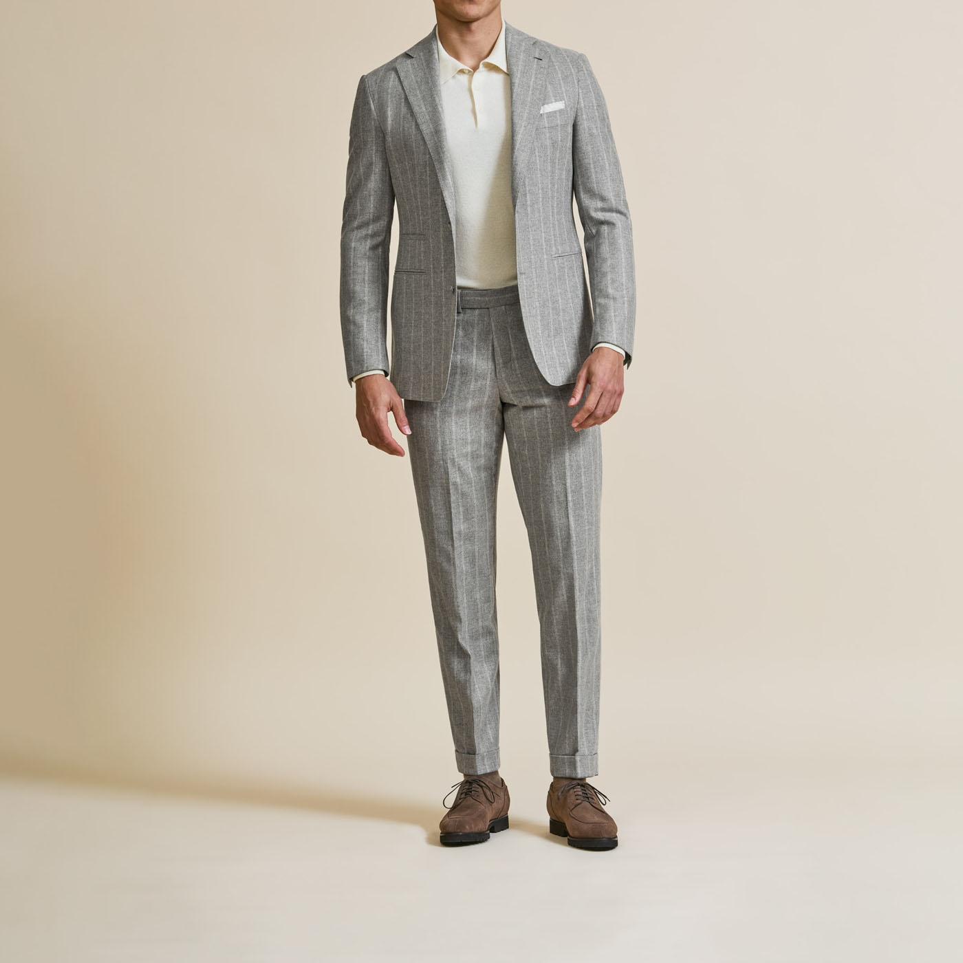 A light gray tailored suit customized by Pearce Bespoke Greater Syracuse.