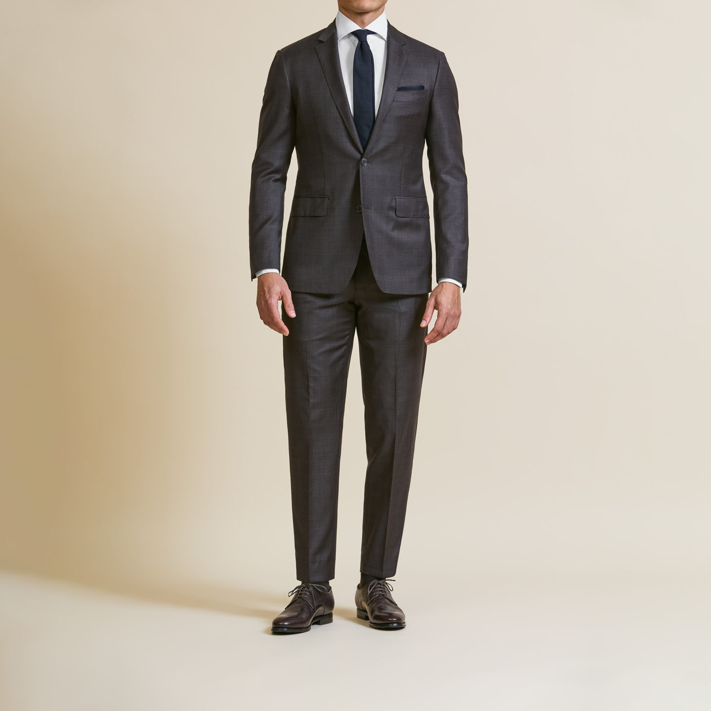 A crisp, classic black custom suit from Pearce Bespoke Greater Syracuse.