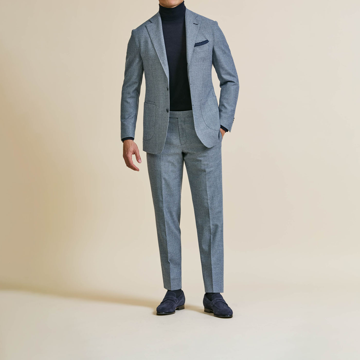 A crisp, classic steel gray custom suit from Pearce Bespoke Greater Syracuse.