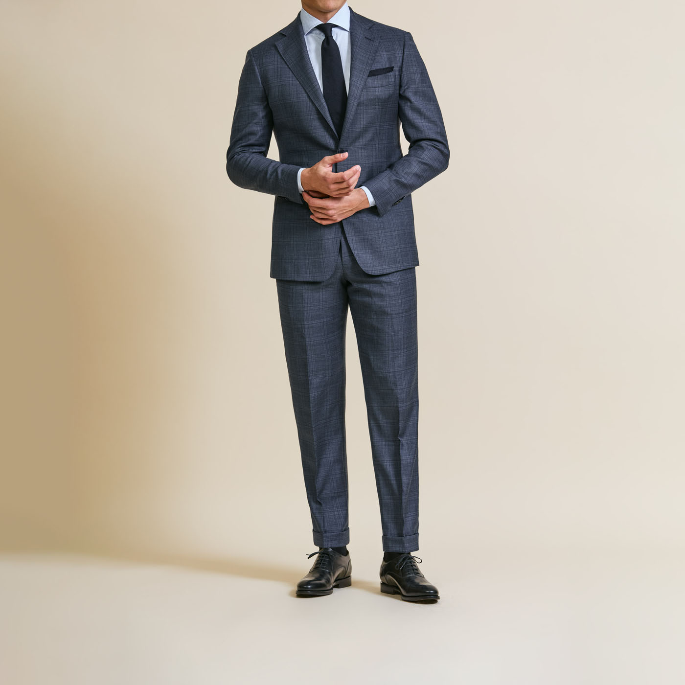 A model styling a classic customized Pearce Bespoke Greater Syracuse suit.