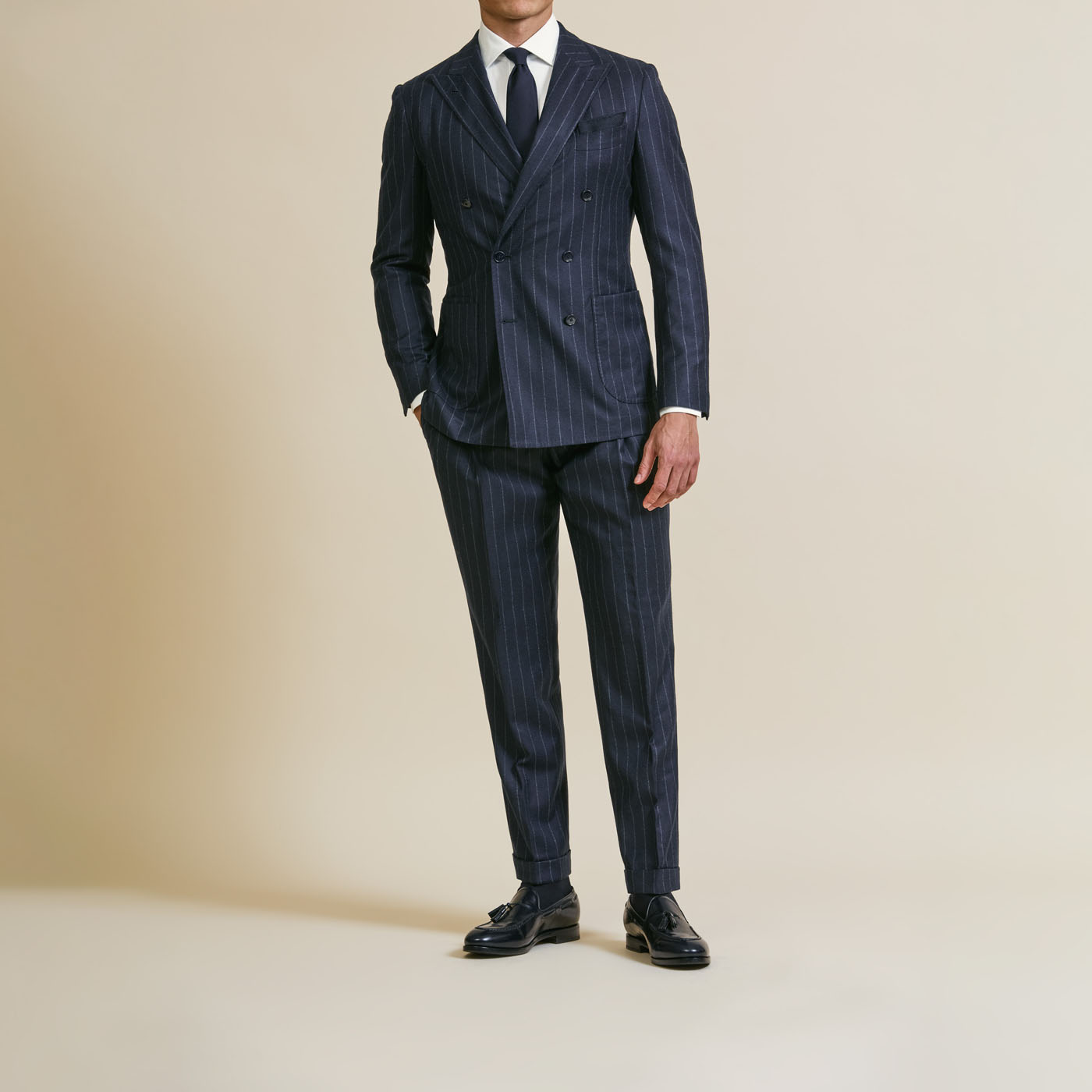 A smooth and sleek black suit from Pearce Bespoke Greater Syracuse.