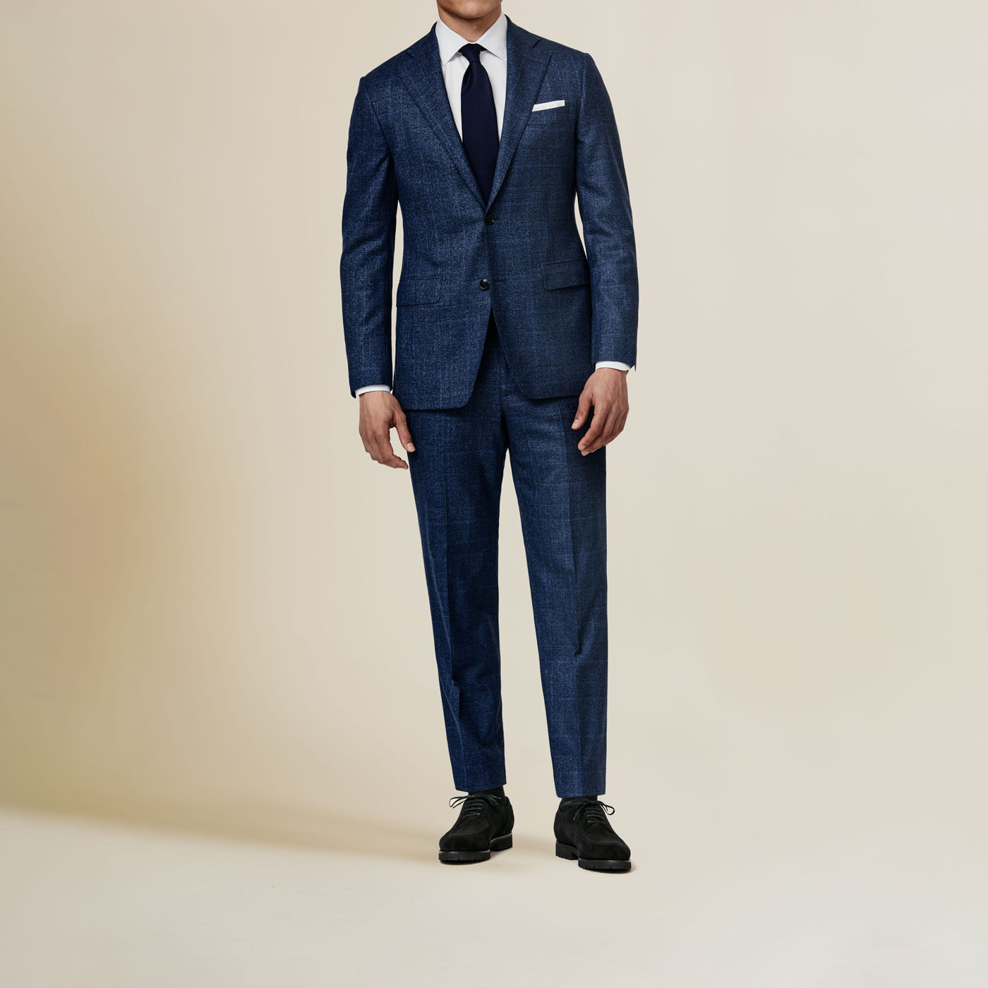 A Pearce Bespoke Greater Syracuse texturized navy blue custom suit on a male model.