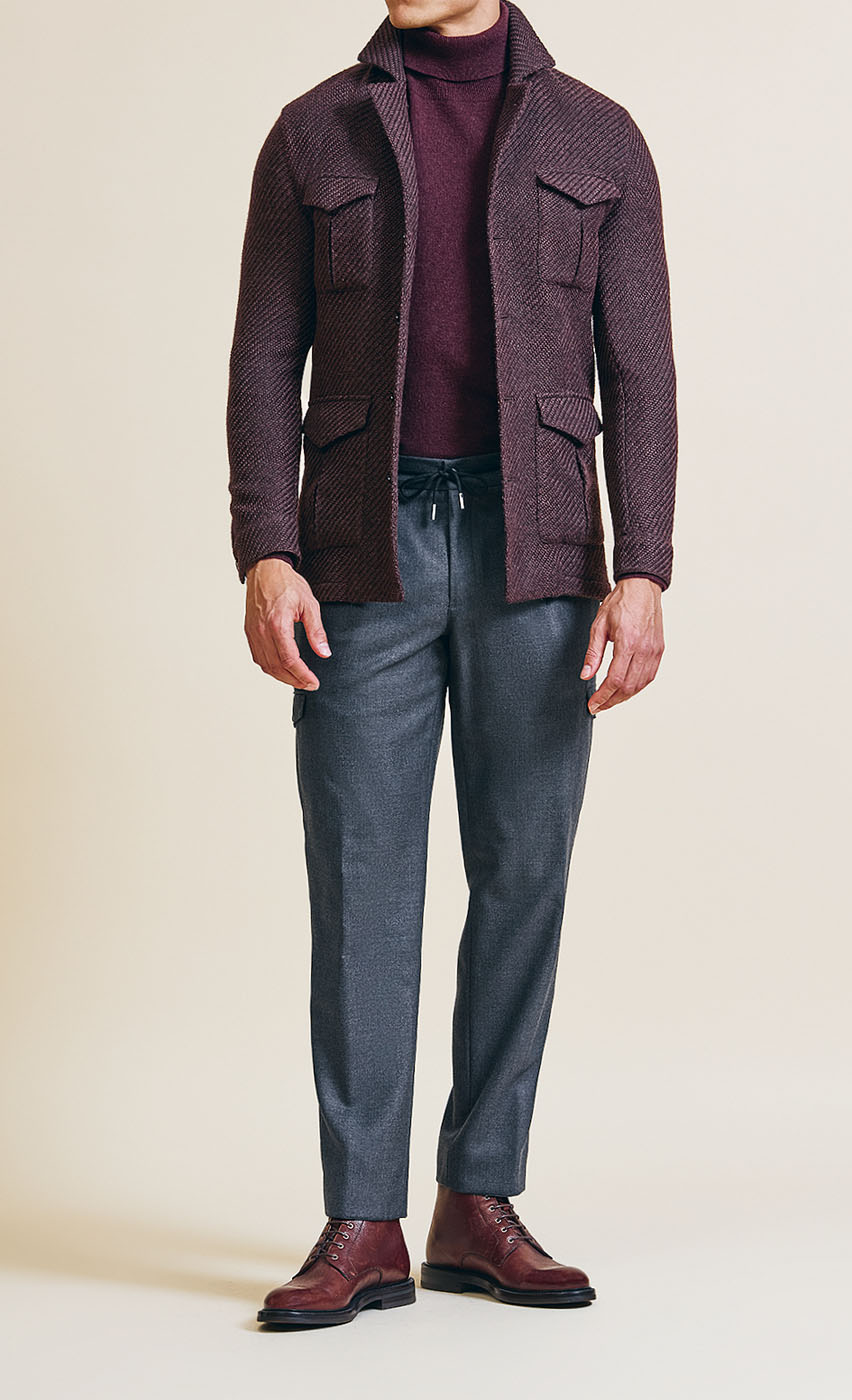 A Pearce Bespoke Greater Syracuse custom plum coat on a male model.
