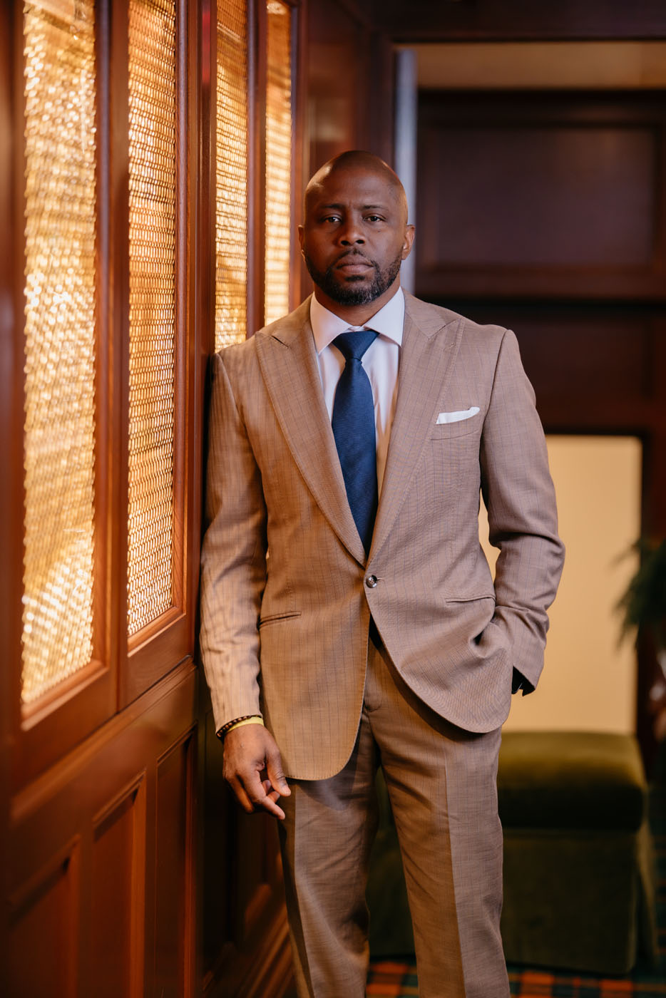 A man wearing tan colored custom suit - find the perfect fit for your proportions with our big and tall suits.