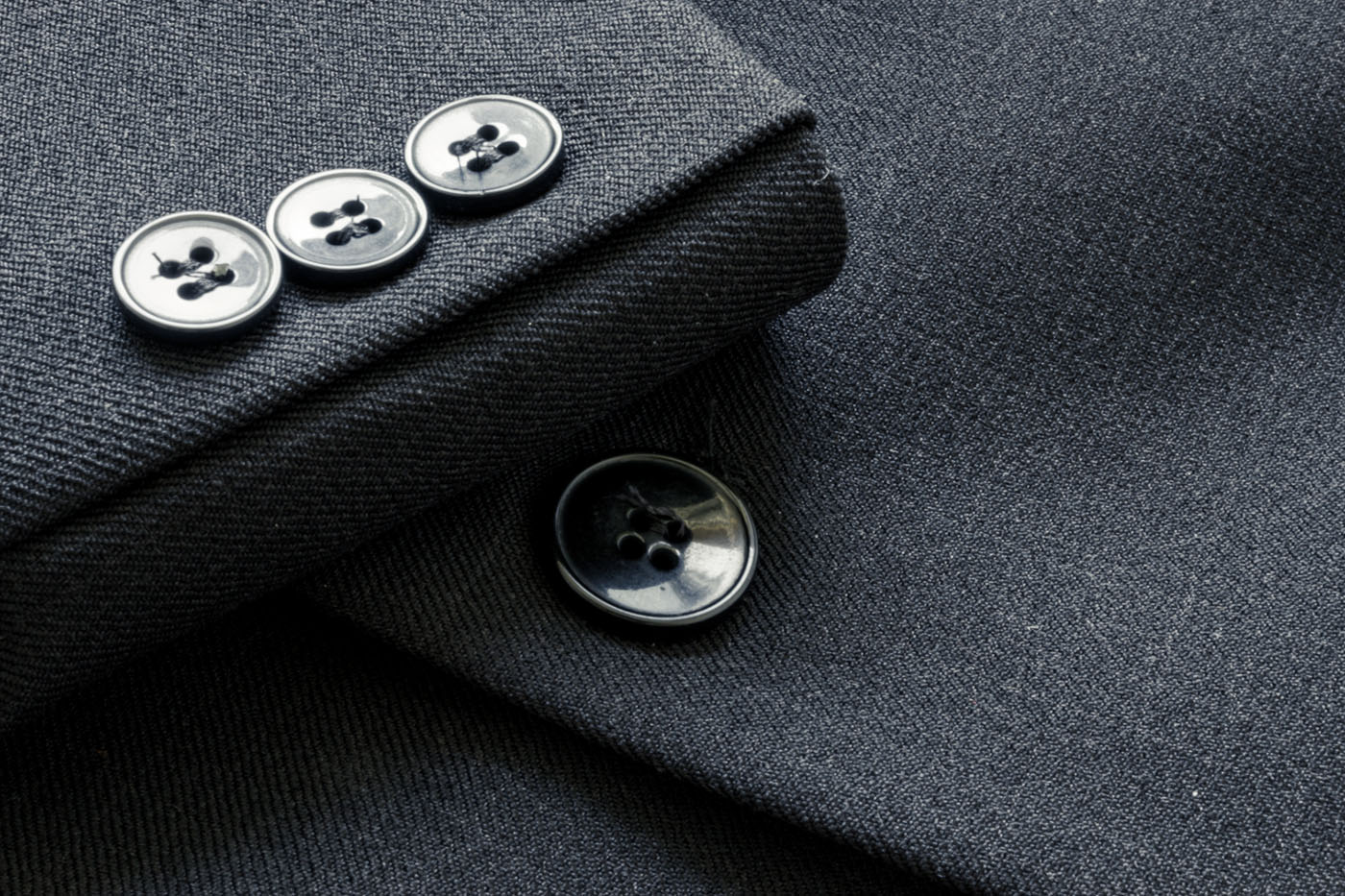 An image of a close up of the cuffs on a suit.