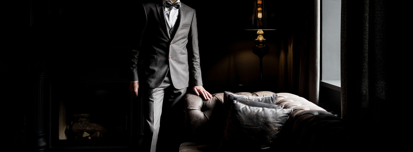 A person wearing a custom suit - Pearce Bespoke mens clothiers in New Orleans, LA can create your perfect outfit.