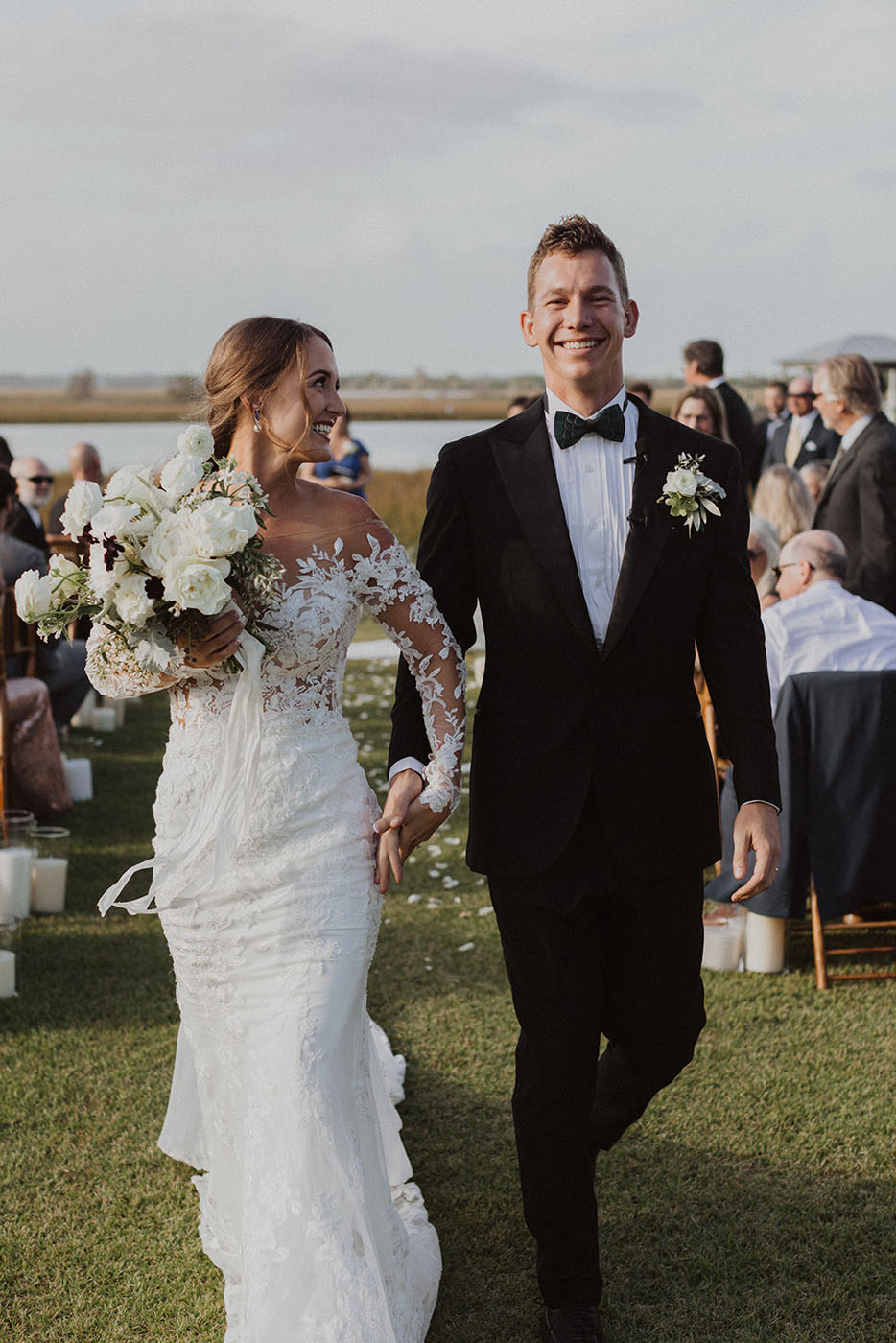 A bride and groom walking down the isle in New Orleans, LA.